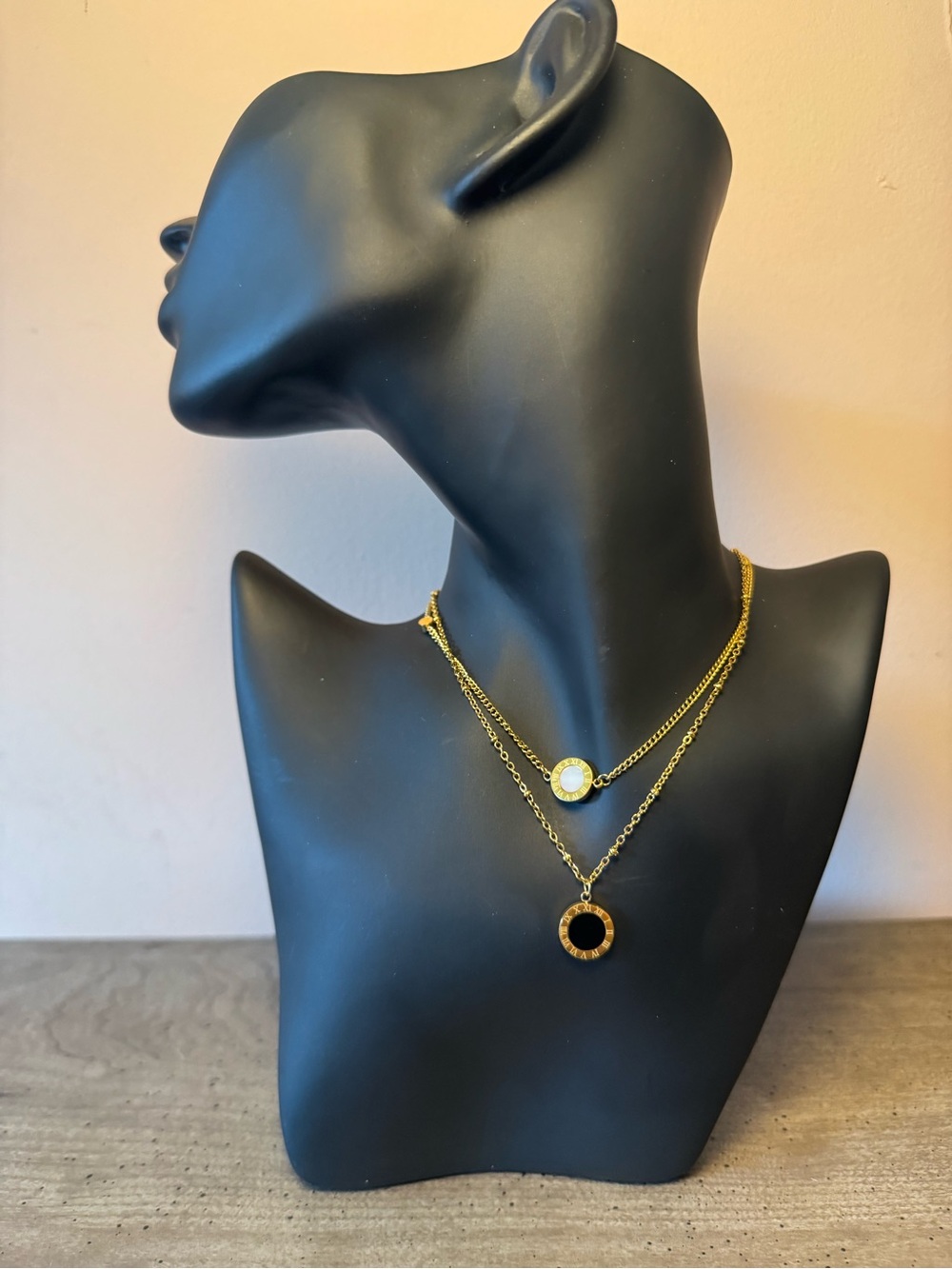 Gold Tone Layered Necklace with Black and White Disc Roman Numeral Pendants